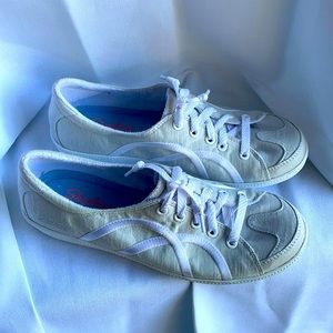 Skechers silvery white tie sneakers.